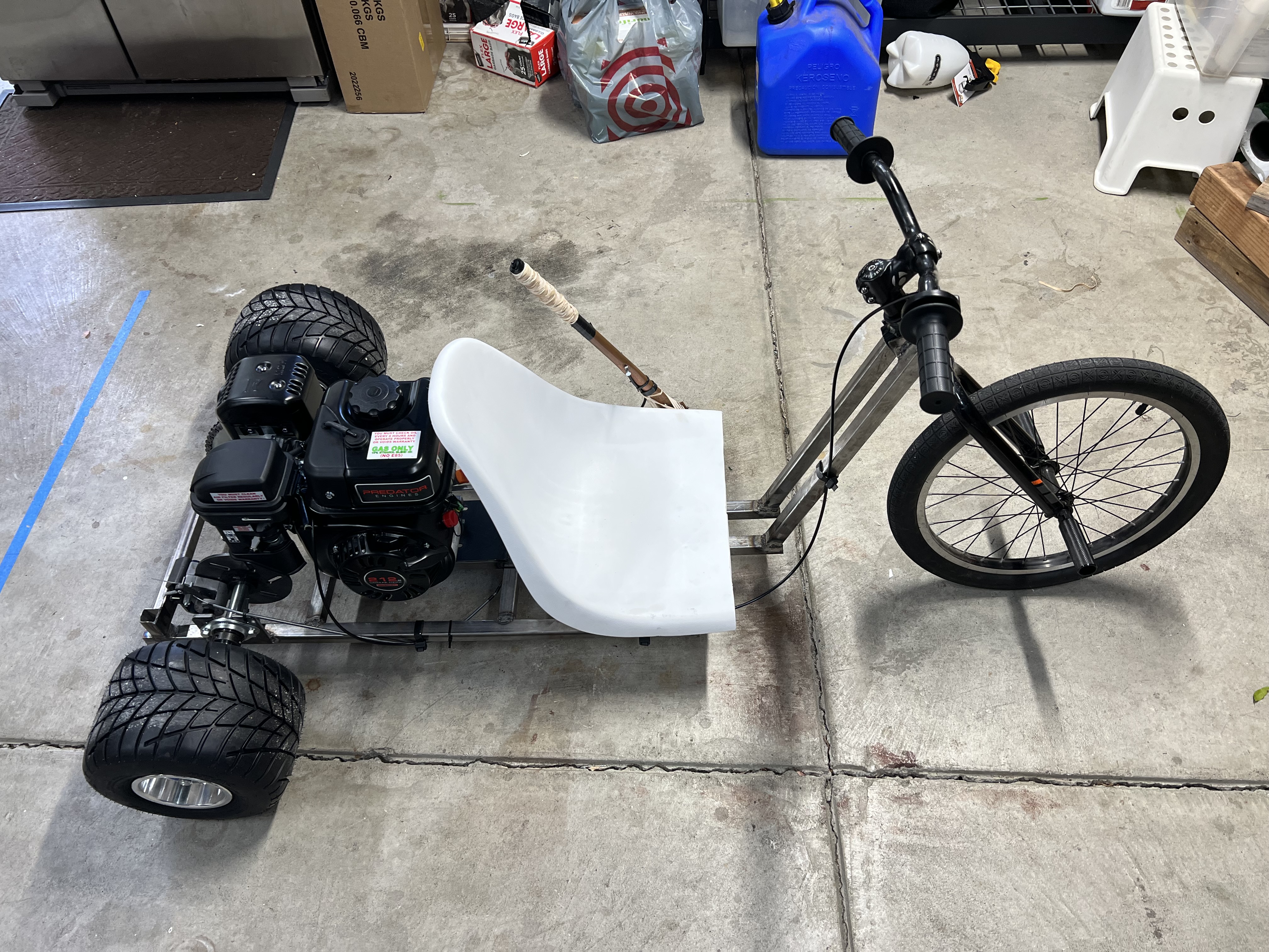 Completed motorized trike with Predator engine, dual rear wheels, and bicycle front fork