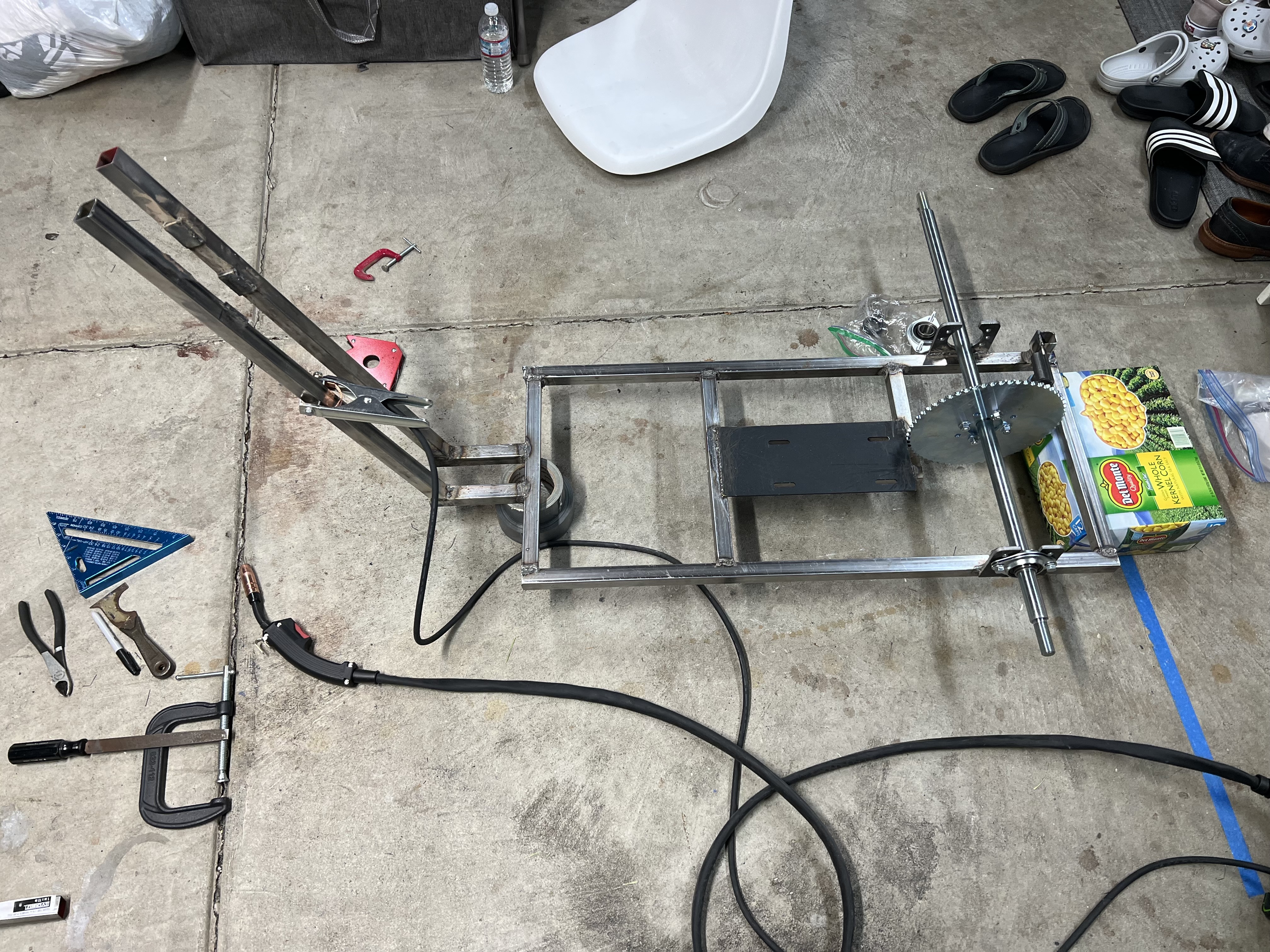 Chassis with front fork, rear axle, and sprocket fitted, mid-weld